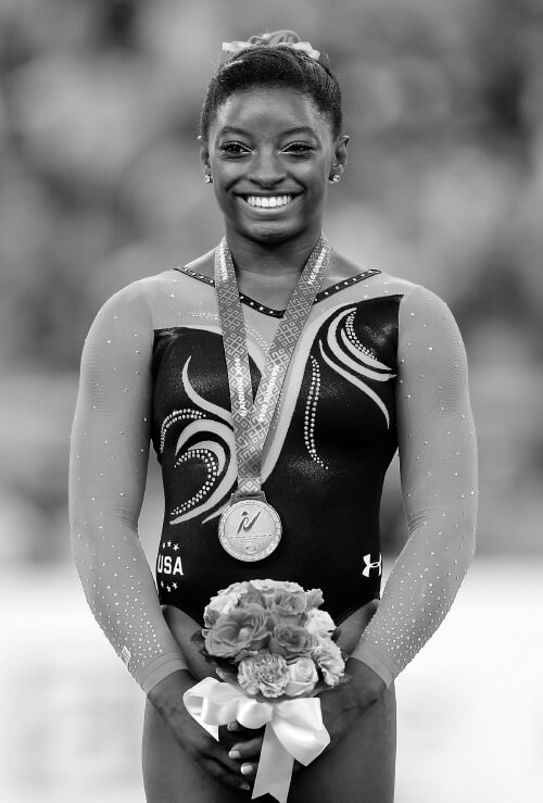 Simone Biles, Jordan Chiles point to bow to Rebeca Andrade on Olympic podium